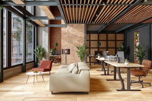 Modern Sustainable Office Interior With Brick Wall, Waiting Area And Indoor Plants.